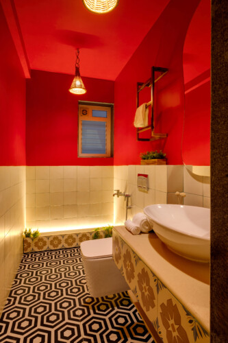 Ina - Villa in Siolim Goa - Washroom 3 with washbasin, shaving mirror, towels, and libght